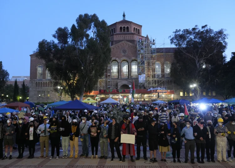 Criticism Of Israel Conflated With Anti-Semitism 1 Pro-Palestinian demonstrators lock arms at UCLA campus.