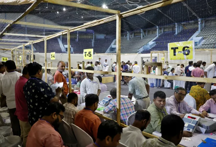 India En Route To Third Stint Of “Modi-fication” 1 Election staff members count votes for India's general election inside a vote counting centre in Kolkata, India, June 4, 2024.