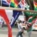 Ghana Needs Trust Reset Amid Rising Political Discontent 12 A man walk past election campaign flags on the street in Accra Ghana Dec. 6