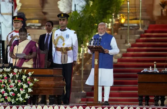 Modi Takes Oath Of Office For Third Term 1 Narendra Modi, right, is sworn-in as the Prime Minister by President Droupadi Murmu, left, at the Rashtrapati Bhawan in New Delhi.