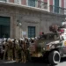 Botched Rebellion Exposes Combustible Situation In Bolivia 14 An armoured vehicle and military police form outside the government palace at Plaza Murillo in La Paz, Bolivia, on Wednesday, June 26, 2024.