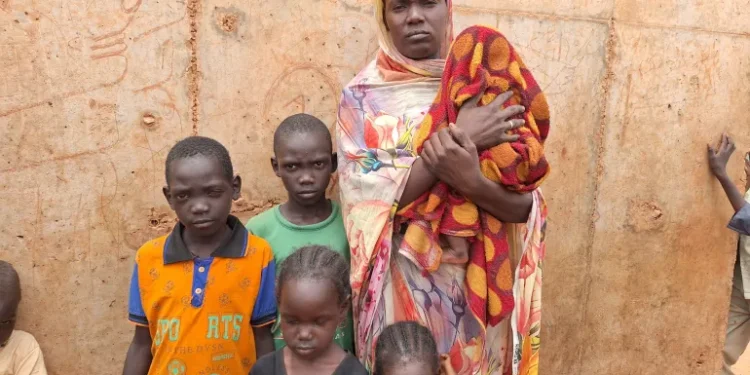 Awatef Mohamad, 27, with her five children