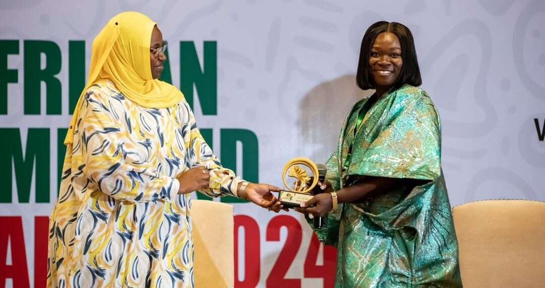 Ms. Jesisca Twumasi receiving the Prestigious Visionary African Female Icon Award at the Visionary African Women Summit held at the Kigali Serena Hotel in Rwanda on  June 14th, 2024