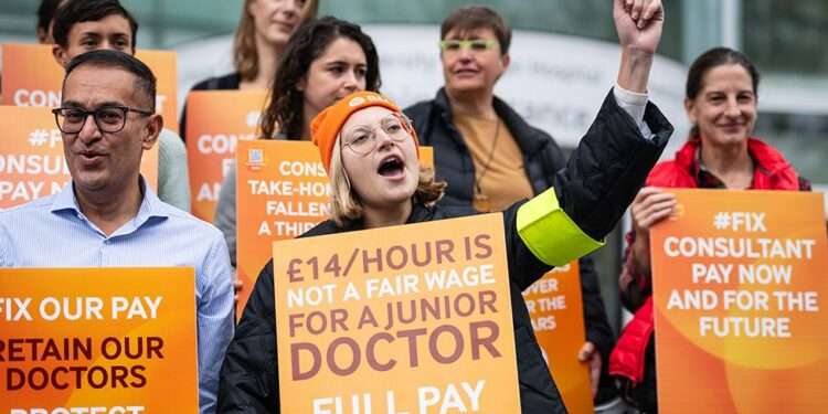 Junior Doctors Optimistic on NHS Pay Dispute Resolution 1 Junior doctors on strike, UK.