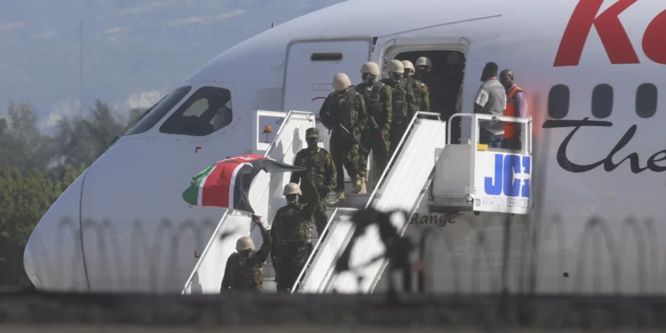 UN-Backed Kenyan Police Arrive in Haiti Amid Escalating Gang Violence 1 Police from Kenya deplane at the Toussaint Louverture International Airport in Port-au-Prince, Haiti.
