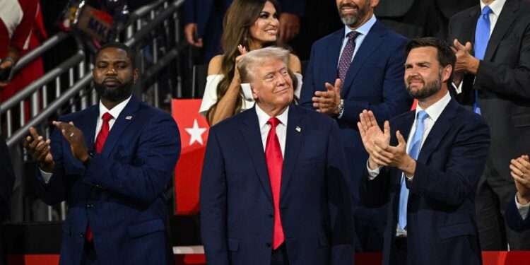 Rep. Byron Donalds with Republican presidential candidate Donald Trump and Republican vice presidential candidate JD Vance during the first day of the 2024 Republican National Convention.