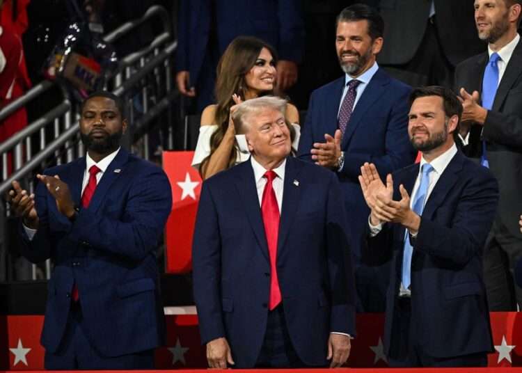 Rep. Byron Donalds with Republican presidential candidate Donald Trump and Republican vice presidential candidate JD Vance during the first day of the 2024 Republican National Convention.