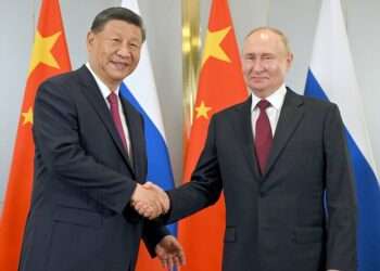 Xi, Putin Bolster China-Russia Ties 5 Chinese President Xi Jinping and Russian President Vladimir Putin.