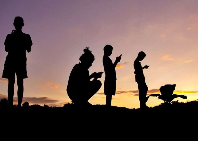 Experts Call for Urgent Action Against Phone Addiction in Children 1 161213135658 05 kids on cell phones health shutterstock 316845479