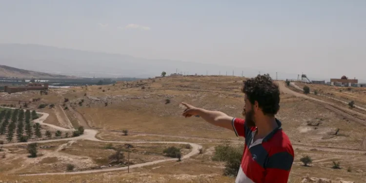 Watchdog Sheds Light On Israel’s Largest Land Grab 1 A Palestinian man points towards a spot seized by Israeli forces outside the Palestinian village of Jiftlik in the occupied West Bank.