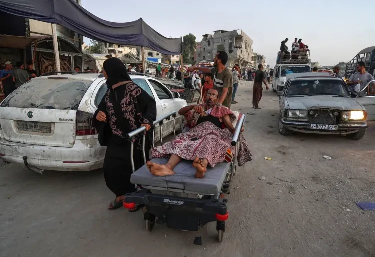 Israel Restarts Cycle Of Internal Displacement In Gaza 1 A man is transported on a hospital bed as displaced Palestinians leave an area in eastern Khan Younis after the Israeli army issued a new evacuation order for parts of the city and Rafah on July 1, 2024.