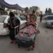 Israel Restarts Cycle Of Internal Displacement In Gaza 12 A man is transported on a hospital bed as displaced Palestinians leave an area in eastern Khan Younis after the Israeli army issued a new evacuation order for parts of the city and Rafah on July 1, 2024.