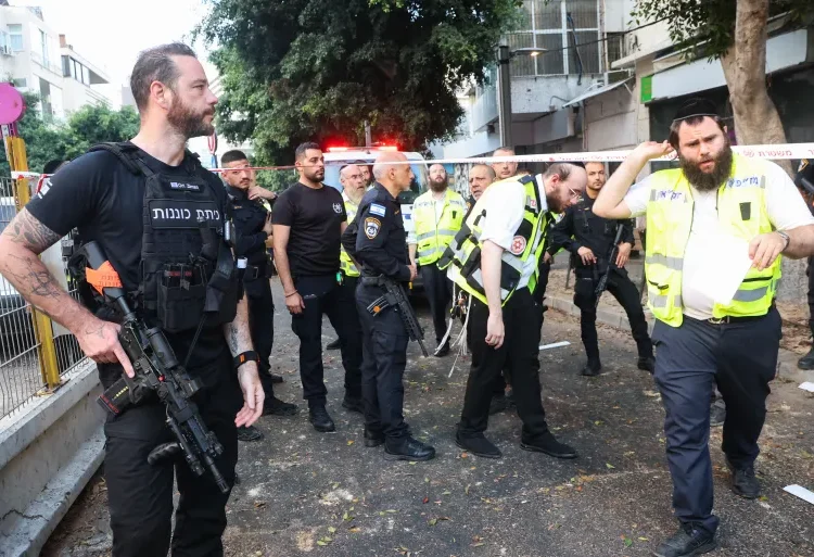 Yemen’s Houthi Strikes Tel Aviv 1 Israeli police at the scene of a drone attack in Tel Aviv on Friday morning.