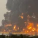 Fire erupts after air strikes on the Yemeni port city of Hodeidah on July 20, 2024.