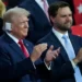 Donald Trump stands next to his vice-presidential pick, Senator JD Vance.