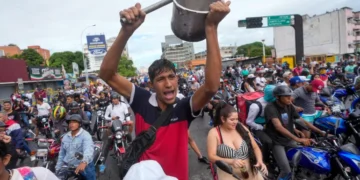 People protest the official election results declaring President Nicolas Maduro the winner of Venezuela's election in Caracas.