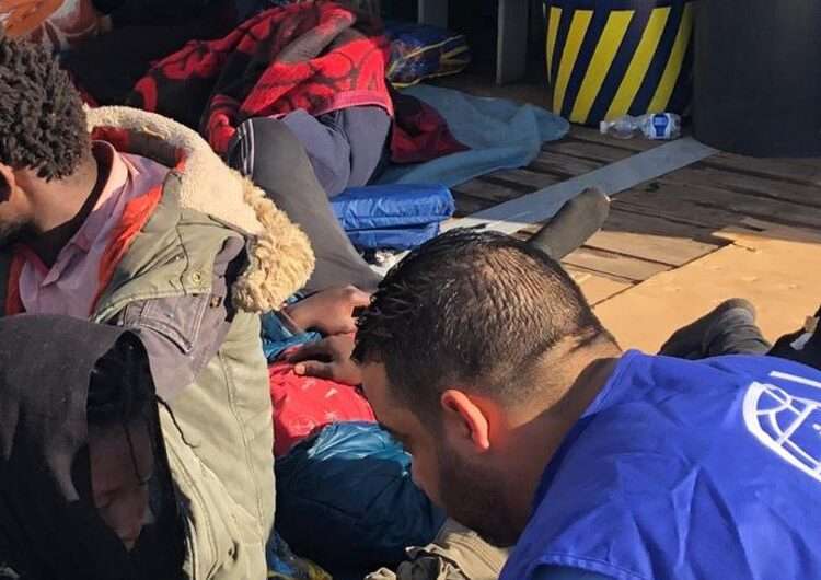UN Urges Action to Protect Migrants Facing Violence and Death in Africa 1 UN migration agency IOM aid workers offer help to migrants who have been returned to shore in Libya