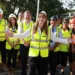 Angela Rayner with outstretched arms in the photo