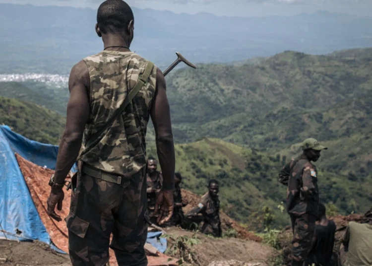 Congolese Soldiers Executed For Desertion 1 FARDC (Armed Forces of the DRC) soldiers dig trenches at a frontline military position above the town of Kibirizi