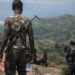 FARDC (Armed Forces of the DRC) soldiers dig trenches at a frontline military position above the town of Kibirizi