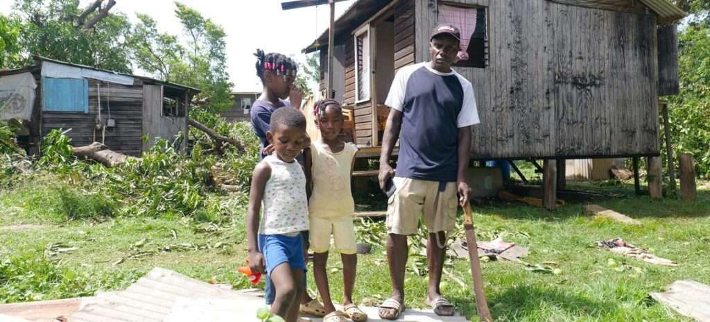 UN Launches $9 Million Aid Plan for Caribbean Islands 2 Family stands by their damaged home