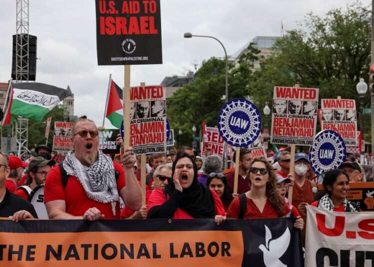 Demonstrators chant and protest near the Capitol in Washington, DC, on Wednesday.