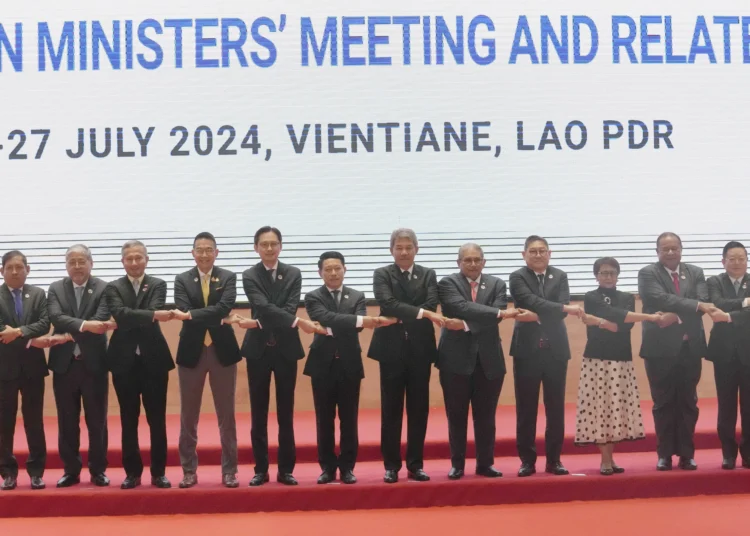 ASEAN Diplomats Meet In Laos 1 Lao Deputy Prime Minister and Minister of Foreign Affairs Saleumxay Kommasith (centre) gathers with other ASEAN foreign ministers.