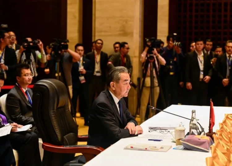ASEAN Diplomats Meet Chinese Foreign Minister 1 China’s Foreign Minister, Wang Yi speaks at the Association of Southeast Asian Nations summit in Vientiane, on July 26, 2024.