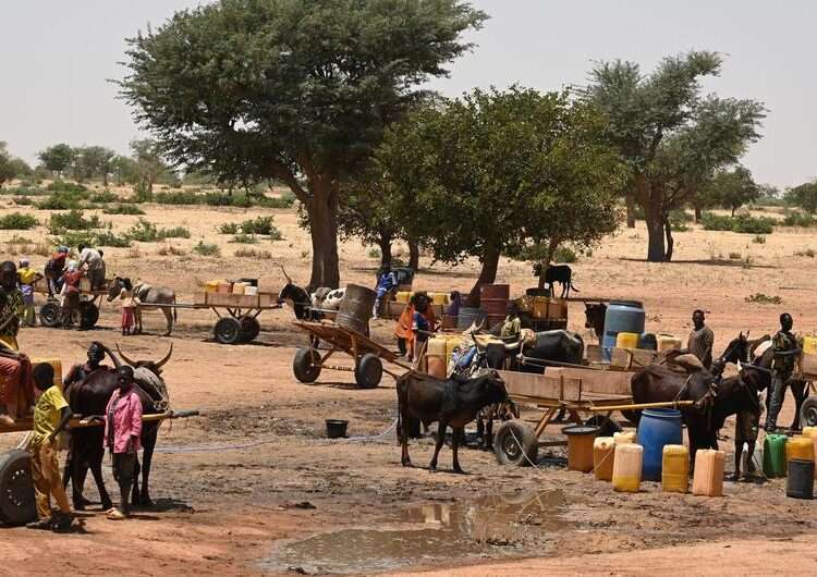 Fresh Attacks In Burkina Faso Drives Thousands Into Niger 1 Children and women collect water in a village in Niger