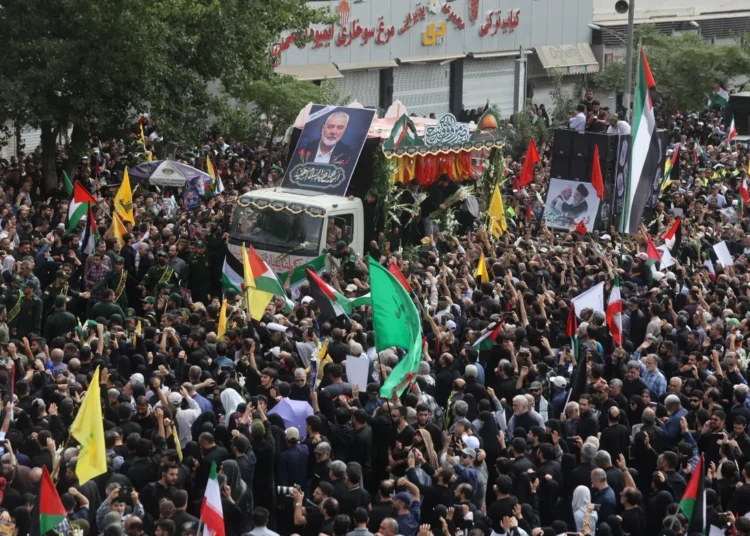 Funeral Service For Ismail Haniyeh Held In Tehran 1 Thousands of people carrying posters of Haniyeh and Palestinian flags gathered in Tehran's city centre for the funeral procession.