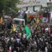 Thousands of people carrying posters of Haniyeh and Palestinian flags gathered in Tehran's city centre for the funeral procession.