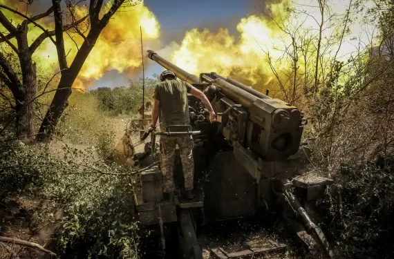 Ukraine Reports Intense Fighting In Pokrovsk 1 Ukrainian servicemen fire a 2S5 'Hyacinth-S' self-propelled howitzer towards Russian troops in the Donetsk region.