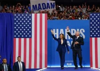 Vice President and Democratic presidential candidate Kamala Harris takes the stage with her newly chosen vice presidential running mate Minnesota Governor Tim Walz during a campaign rally in Philadelphia.