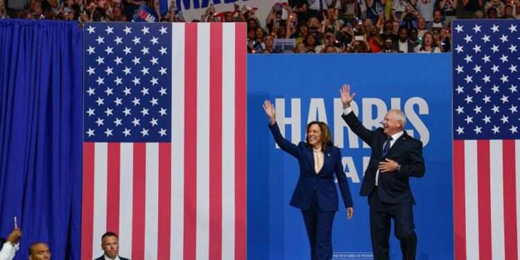 Vice President and Democratic presidential candidate Kamala Harris takes the stage with her newly chosen vice presidential running mate Minnesota Governor Tim Walz during a campaign rally in Philadelphia.
