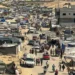 Families take what they can carry as they leave their homes and shelters in Khan Younis on August 11, 2024.