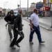 UN Records Surge In Israeli Forces Killing In Occupied West Bank 11 Israeli settlers walk with batons and axes along a street as Palestinian residents and shops were attacked in the town of Huwara in the occupied West Bank.