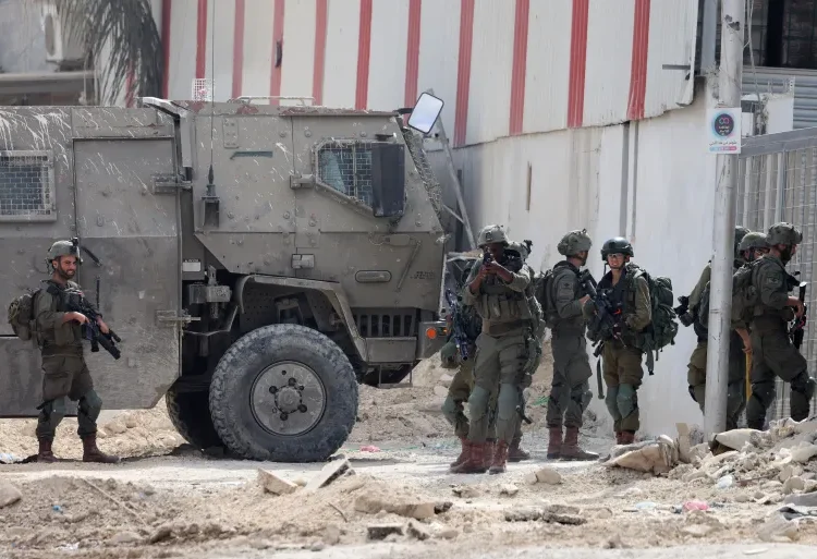Finland Slams Israel’s Forced Eviction Of Palestinians In Occupied West Bank 1 Israeli soldiers operate during a raid in the Nur Shams camp near Tulkarem in the Israeli-occupied West Bank, on August 28, 2024.