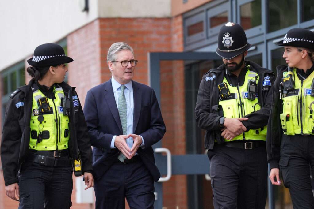 Keir starmer with police officers