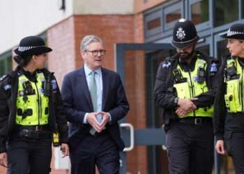 UK Government Targets Online Hate After Unrest 4 Keir Starmer with some police officers