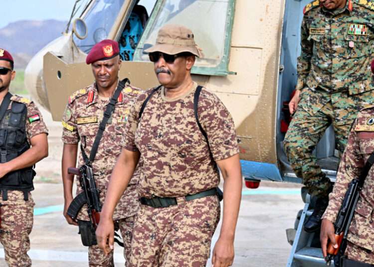 Geneva Peace Talks Struggle Amid Sudan's Escalating Crisis 1 Sudan's army chief Abdel Fattah al-Burhan (C) arrives at a graduation ceremony in Gibet near Port Sudan on July 31, 2024.