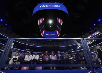Delegates watch during the DNC on Monday, August 19, 2024.