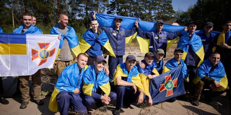 Russia And Ukraine Exchange 206 Prisoners Of War 1 This handout photograph taken and released by the Ukrainian Presidential Press Service on September 14, 2024 shows Ukrainian prisoners of war (POWs) posing for a photo following a swap at an undisclosed location in Ukraine.