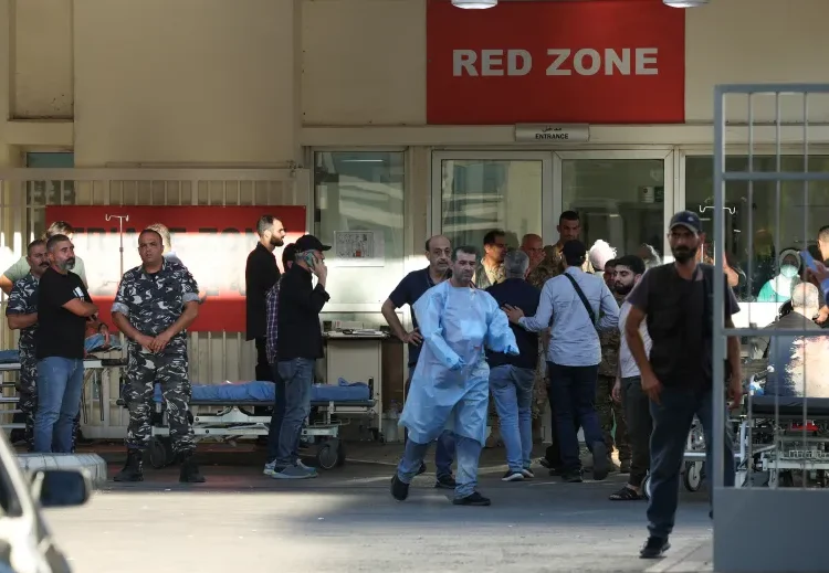 People gather outside a hospital in Beirut.