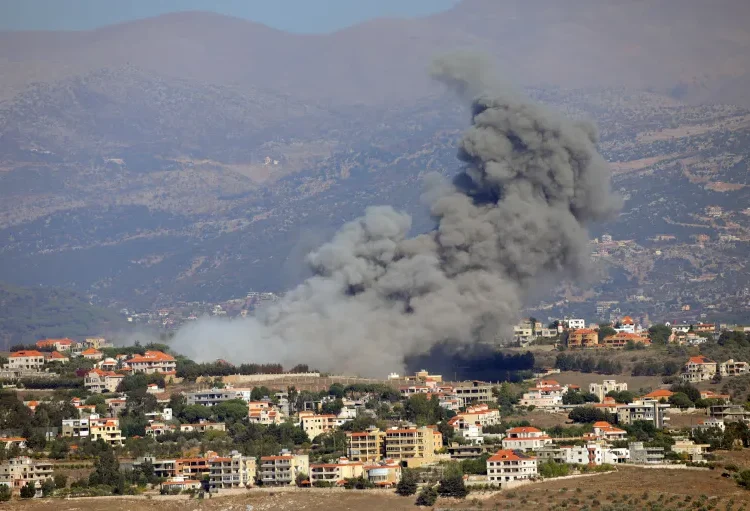 Joint Call Issued For 21-Day Ceasefire Across Lebanon-Israel Border 1 Smoke billows over Khiam, as seen from Marjayoun, in southern Lebanon near the border with Israel on September 25, 2024.