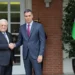 Spain's Prime Minister Pedro Sanchez (R) welcomes Palestinian president Mahmoud Abbas as he arrives before their meeting at La Moncloa Palace in Madrid on September 19, 2024.