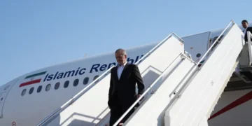 Iran's President, Masoud Pezeshkian disembarks from his plane upon landing in Baghdad, September 11, 2024.