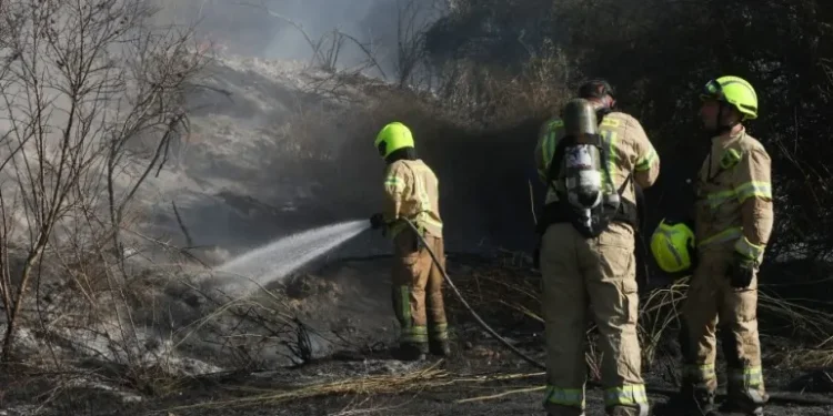 Netanyahu Vows To Exact Heavy Price On Houthis 1 Responders put out a fire in the area of Lod, near Tel Aviv, in central Israel on September 15, 2024.