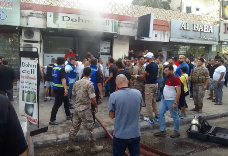 Qatar Bemoans International Community’s Silence On Lebanon Blasts 1 People and first responders gather at the scene of a reported device explosion in Saida in southern Lebanon.