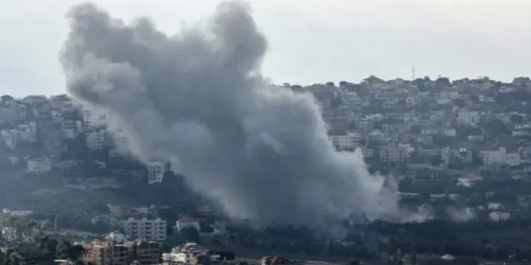Smoke billows from the site of an Israeli strike that targeted the southern Lebanese village of Khiam on September 22, 2024.
