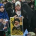 Three girls take part in a protest march to condemn the killing of Hassan Nasrallah, late leader of the Lebanese group Hezbollah, in Islamabad, Pakistan on September 29, 2024.